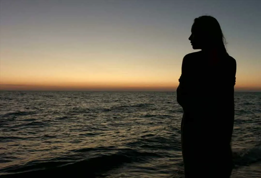 Key West sunset cruise woman watching last light