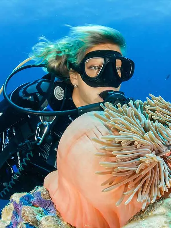 Woman discover life on a Florida Keys barrier reef during some Key West Scuba Diving