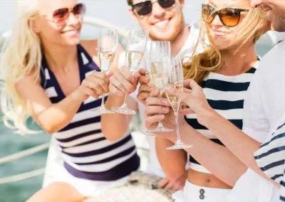Girls drinking champagne with key west yacht rentals